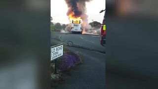 Minibus Burns On Quiet Street