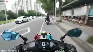 Motorcyclist Extends Karma To Several People Riding Scooters