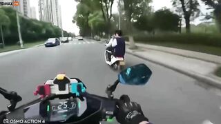 Motorcyclist Extends Karma To Several People Riding Scooters