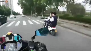 Motorcyclist Extends Karma To Several People Riding Scooters
