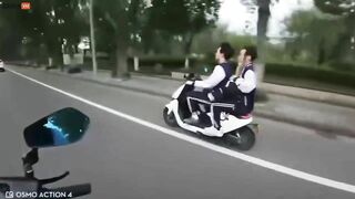 Motorcyclist Extends Karma To Several People Riding Scooters