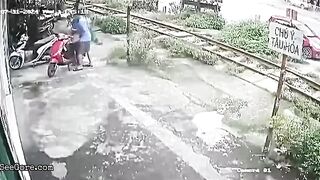 Motorcyclist Parked On Railroad Tracks Hit By Train