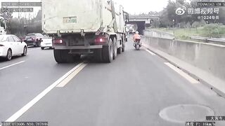 Motorcyclist Hit In The Head By Truck