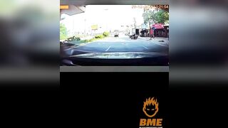 Speeding Motorbike Rider Falls Face Down Behind Truck