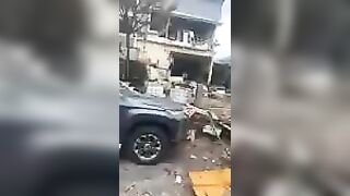 Standing In Front Of The Site Of A Chemical Explosion At A Factory