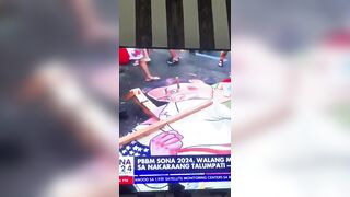 Stepping On A Cardboard Cutout