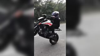 Attempt To Lift The Front Wheel Resulting In A Head-on Collision
