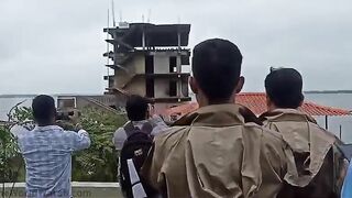 Man Filmed Building Collapse Video And Was Hit By Flying Rocks