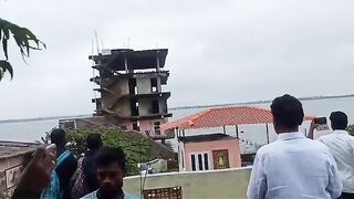 Man Filmed Building Collapse Video And Was Hit By Flying Rocks