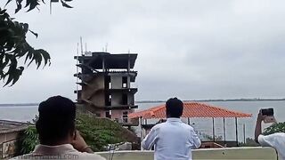 Man Filmed Building Collapse Video And Was Hit By Flying Rocks