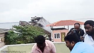 Man Filmed Building Collapse Video And Was Hit By Flying Rocks