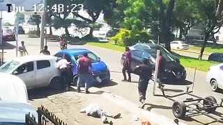 Mexican Cyclist Pelted With Rag Doll