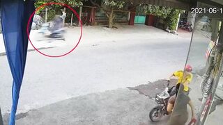 Motorcyclist So Focused On Looking At Woman He Crashes Face First Into Wall