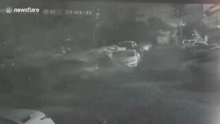 Out-of-control Tesla Crashes Through Parking Barrier In China