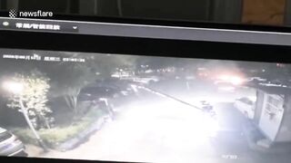 Out-of-control Tesla Crashes Through Parking Barrier In China