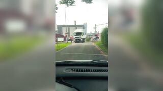 Passenger Train Collides With Trapped Truck At Level Crossing
