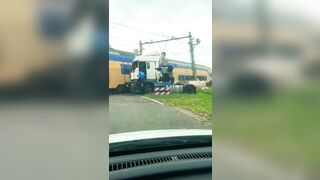 Passenger Train Collides With Trapped Truck At Level Crossing