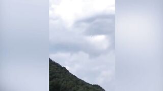 Rocket Crash Causes Orange Chemical Cloud