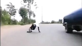 Skater Crashes Into Full-size Motorcycle - Slow Motion