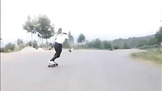 Skater Crashes Into Full-size Motorcycle - Slow Motion