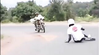 Skater Crashes Into Full-size Motorcycle - Slow Motion