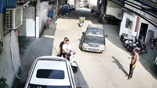 Stupid Chinese Man Squeezed Between Truck And Car
