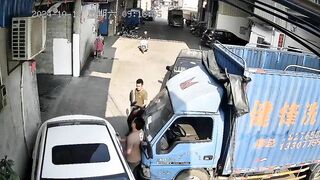 Stupid Chinese Man Squeezed Between Truck And Car