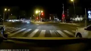 Three Cyclists Hit Taxi