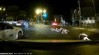 Three Cyclists Hit Taxi