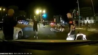 Three Cyclists Hit Taxi