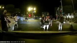 Three Cyclists Hit Taxi