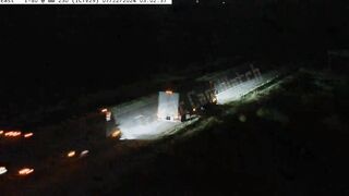 A Semi-trailer Truck Collided With A Parked Semi-trailer Truck In Iowa, Causing It To Overturn
