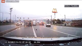 Truck Driver Ignores Red Light, Collides With Six Cars