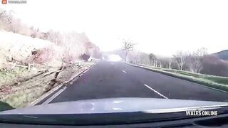 Two Cars Simultaneously Try To Overtake A Delivery Truck