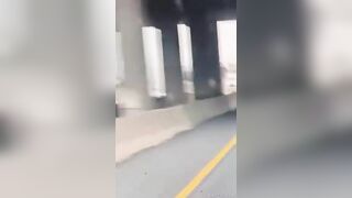 Vehicles Driving In The Opposite Direction On The Highway