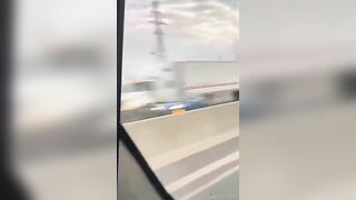 Vehicles Driving In The Opposite Direction On The Highway
