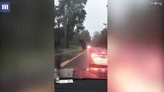 WTF: Car Appears To Be Floating In A Massive Storm