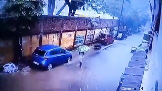 A Wall Collapsed And Hit A Woman Walking On The Street