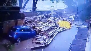 A Wall Collapsed And Hit A Woman Walking On The Street