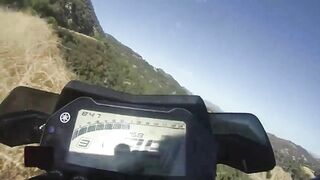 Watch This Biker Fall Off A Cliff And Survive