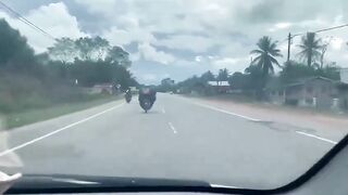 The Big Guy On The Motorcycle Is Having A Bad Day