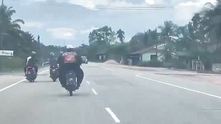 The Big Guy On The Motorcycle Is Having A Bad Day