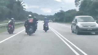 The Big Guy On The Motorcycle Is Having A Bad Day