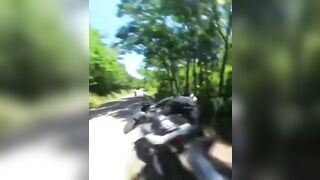 Cyclist Thrown Over Guardrail